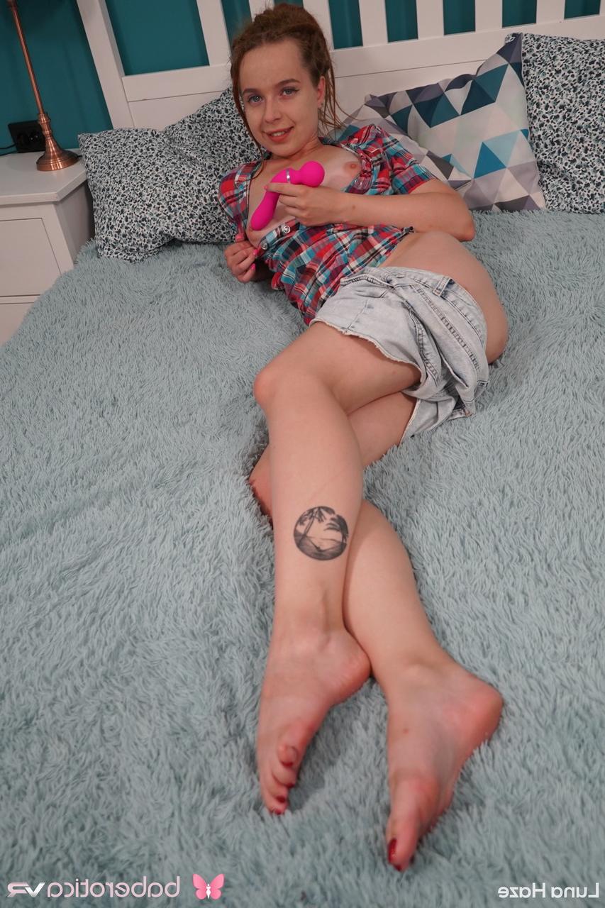 20P Little babe Luna Haze gets rid of her jean shorts and masturbates with a toy