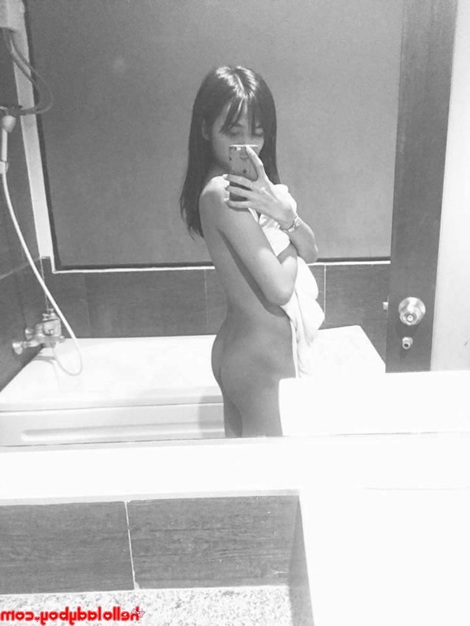 18P Cute Asian ladyboy Pon posing seductively in her solo compilation