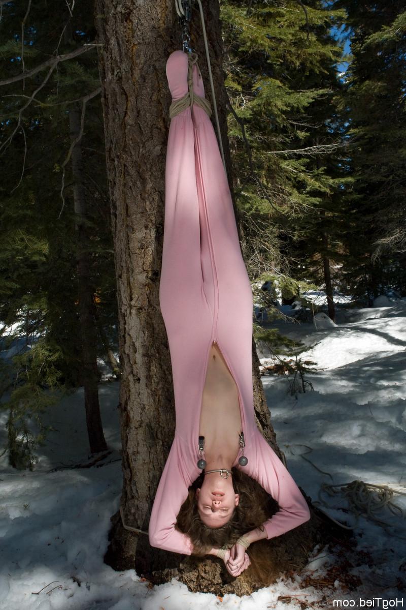 20P Submissive babe Amber Keen gets tied up in rope bondage outdoors