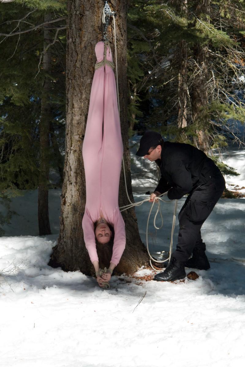 20P Submissive babe Amber Keen gets tied up in rope bondage outdoors