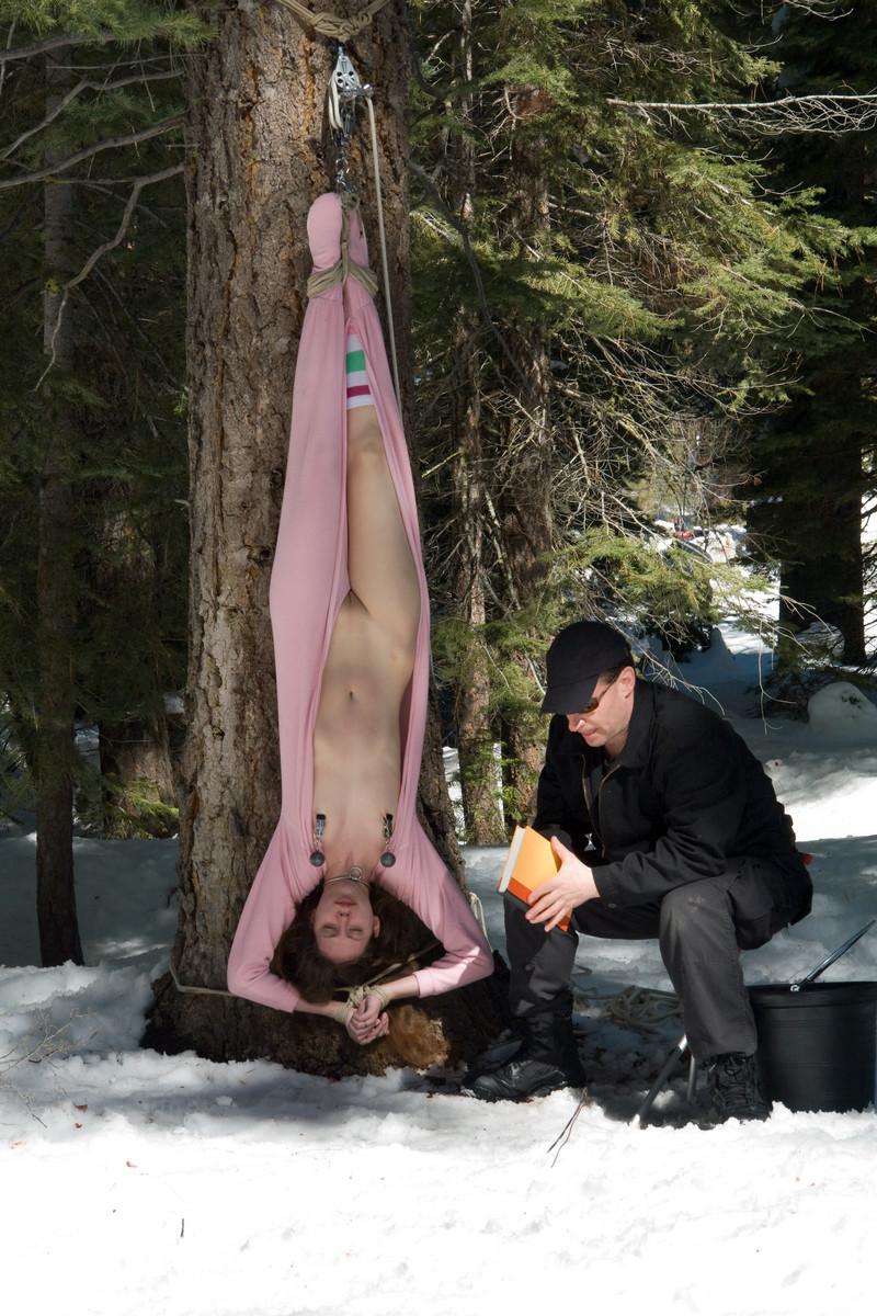 20P Submissive babe Amber Keen gets tied up in rope bondage outdoors