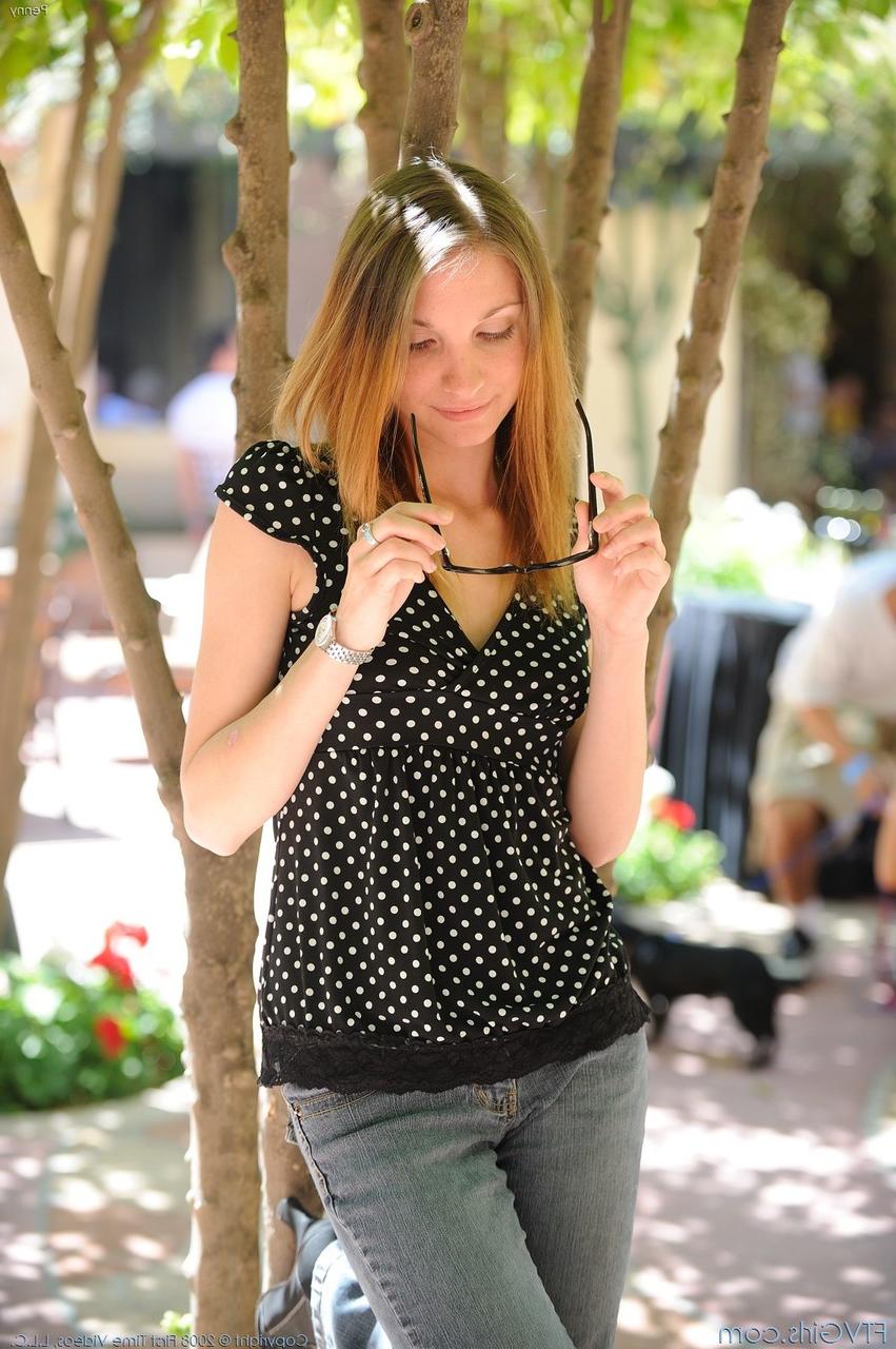 20P Gorgeous amateur babe strips in a public parking lot and poses naked