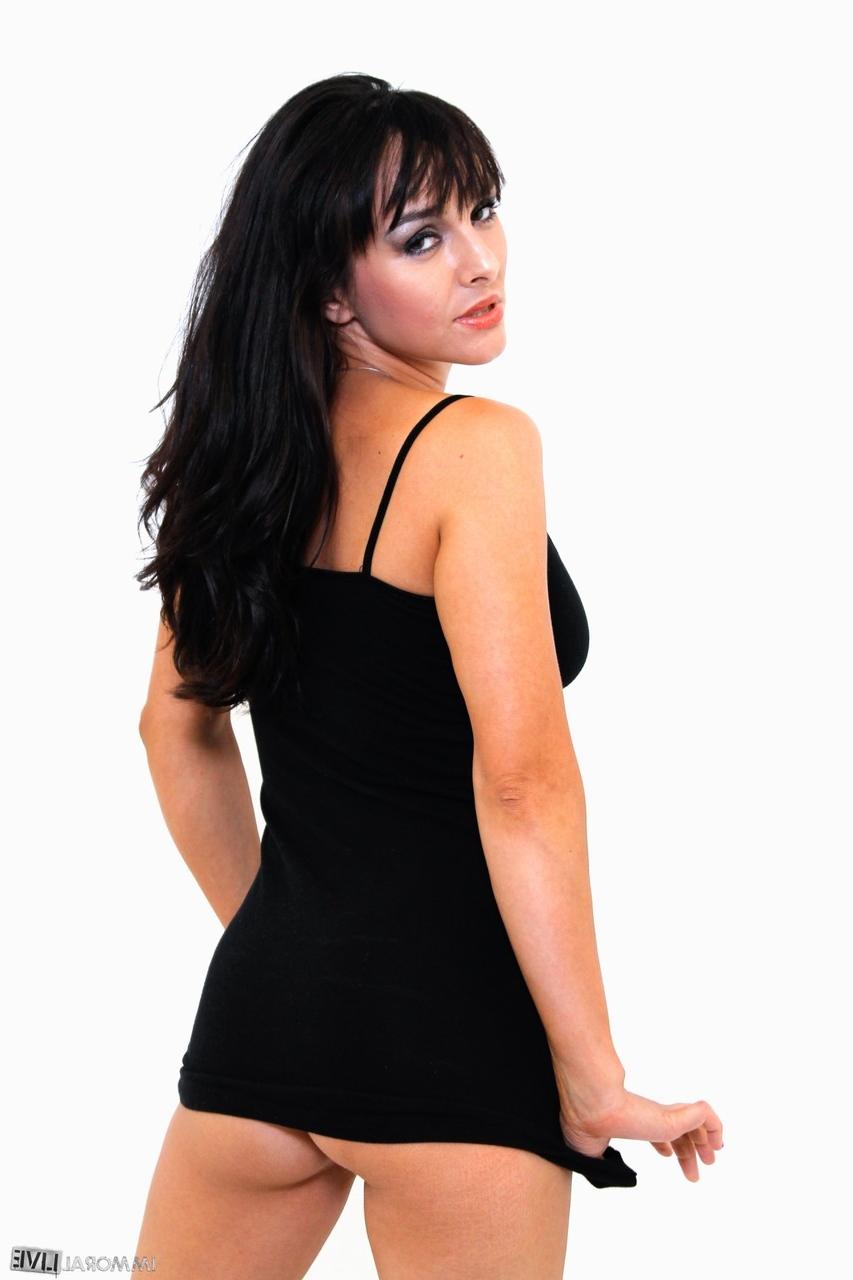 15P Dark haired MILF Cytherea discards a short dress to pose nude in socks