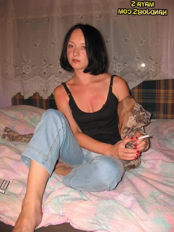 14P Raven-haired babe Maya strips and touches herself while smoking a cigarette