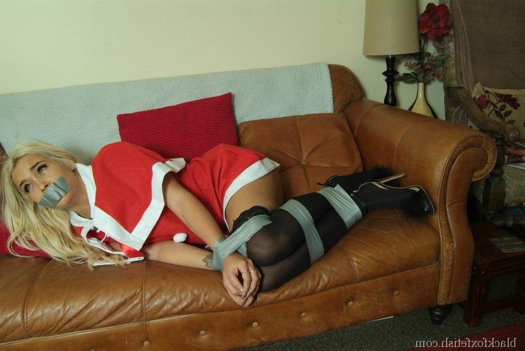 16P Beautiful blonde is silenced and restrained with duct tape in an Xmas outfit