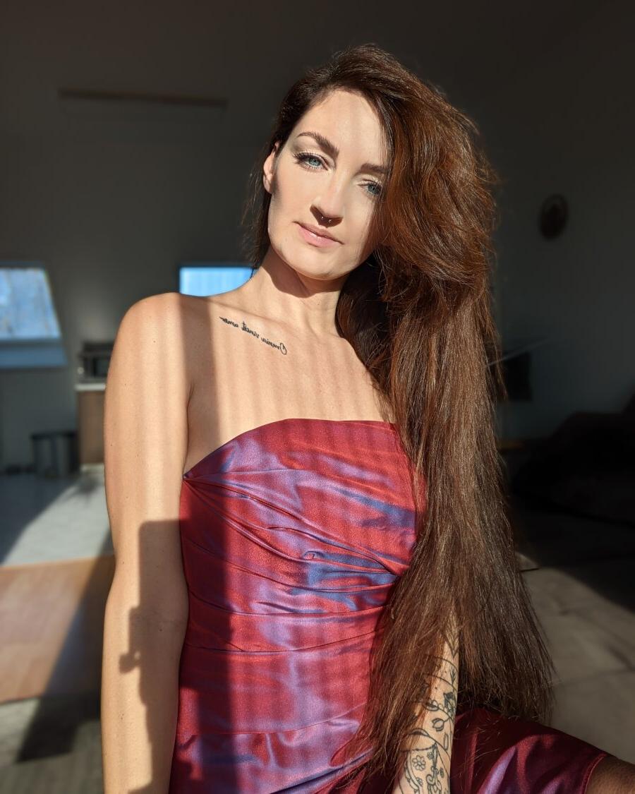 20P Seductive inked Lara Lauren teases with her covered big tits in a compilation