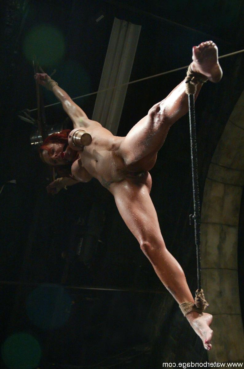 20P Bound & ball-gagged MILF Shannon Kelly gets sprayed by water in the dungeon