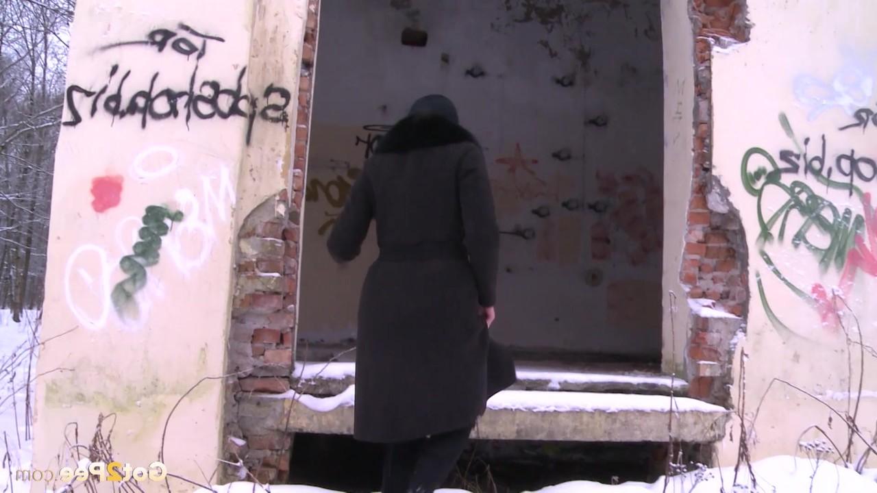 15P Caucasian woman Dasha pees in abandoned building during the winter