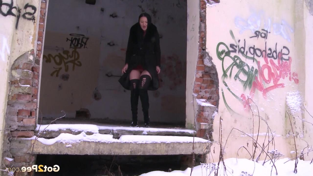 15P Caucasian woman Dasha pees in abandoned building during the winter
