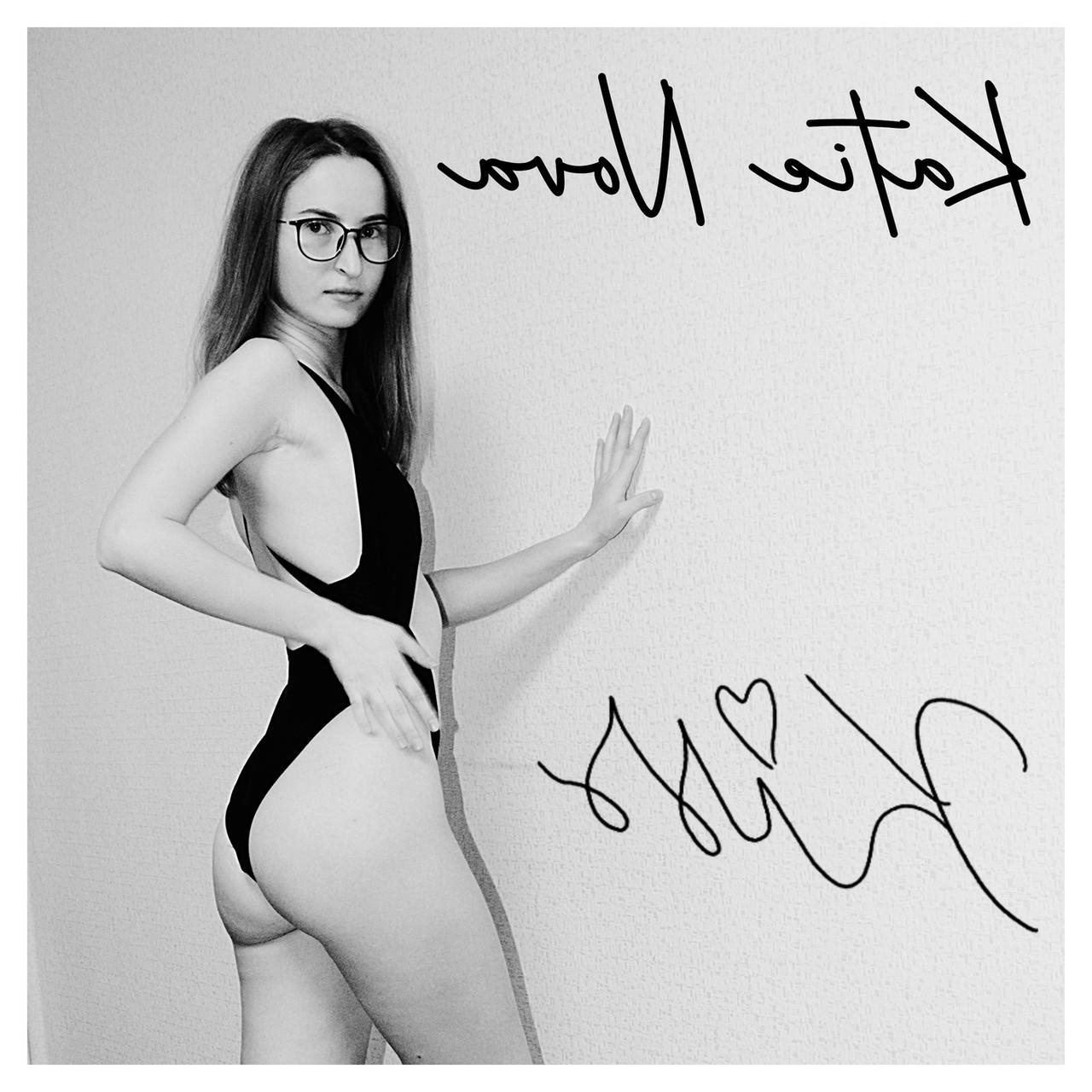 20P Attractive amateur model Katie posing in her black swimsuit in a solo