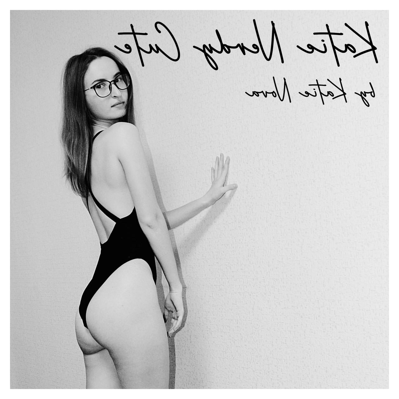 20P Attractive amateur model Katie posing in her black swimsuit in a solo