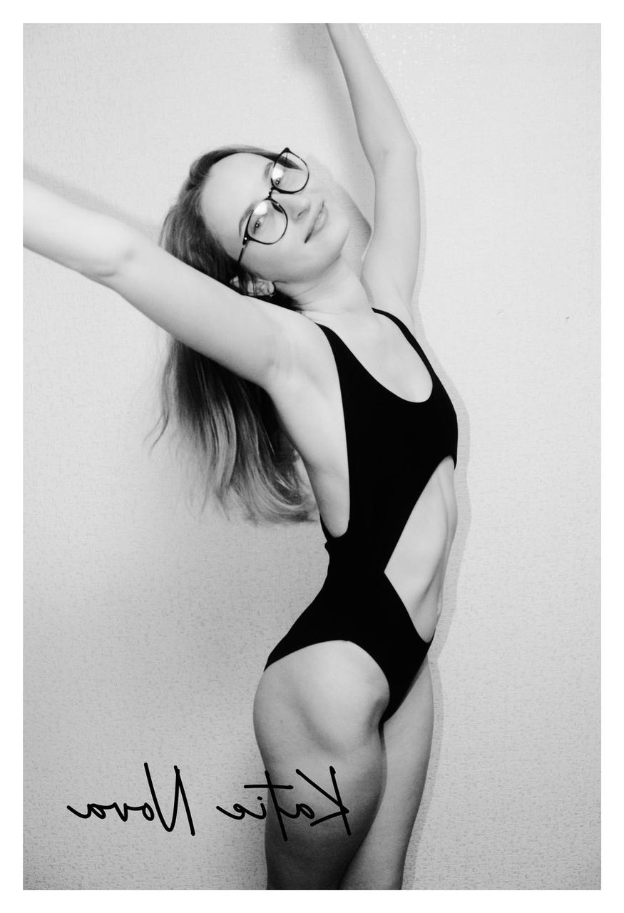 20P Attractive amateur model Katie posing in her black swimsuit in a solo