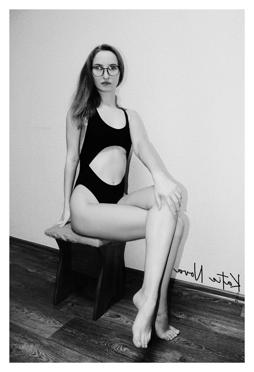 20P Attractive amateur model Katie posing in her black swimsuit in a solo