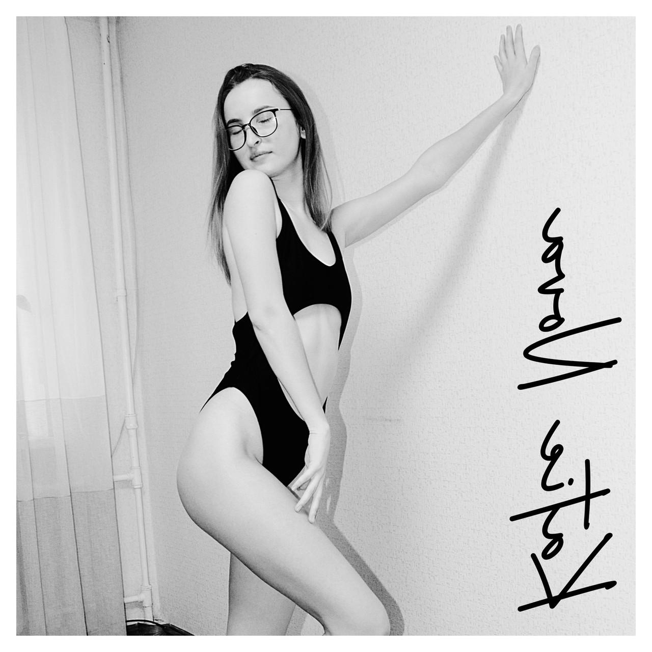 20P Attractive amateur model Katie posing in her black swimsuit in a solo