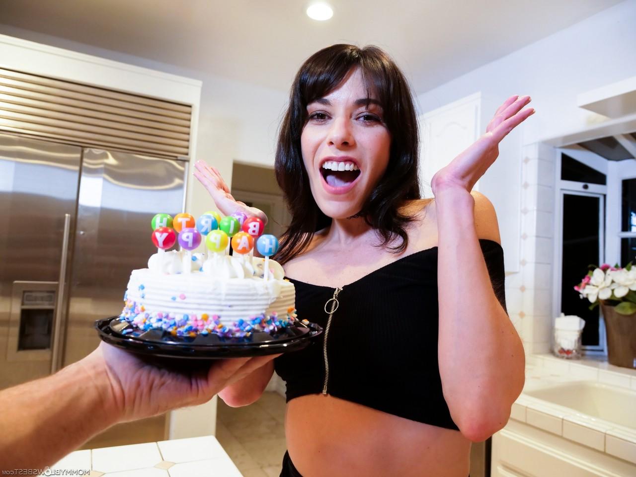 15P Brunette MILF Lexi Foxy is gifted a cake before giving a POV blowjob