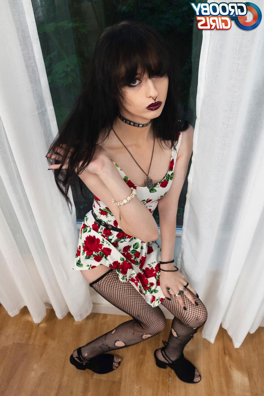 16P Raven-haired shemale Spite strips to her stockings & toys her big ass