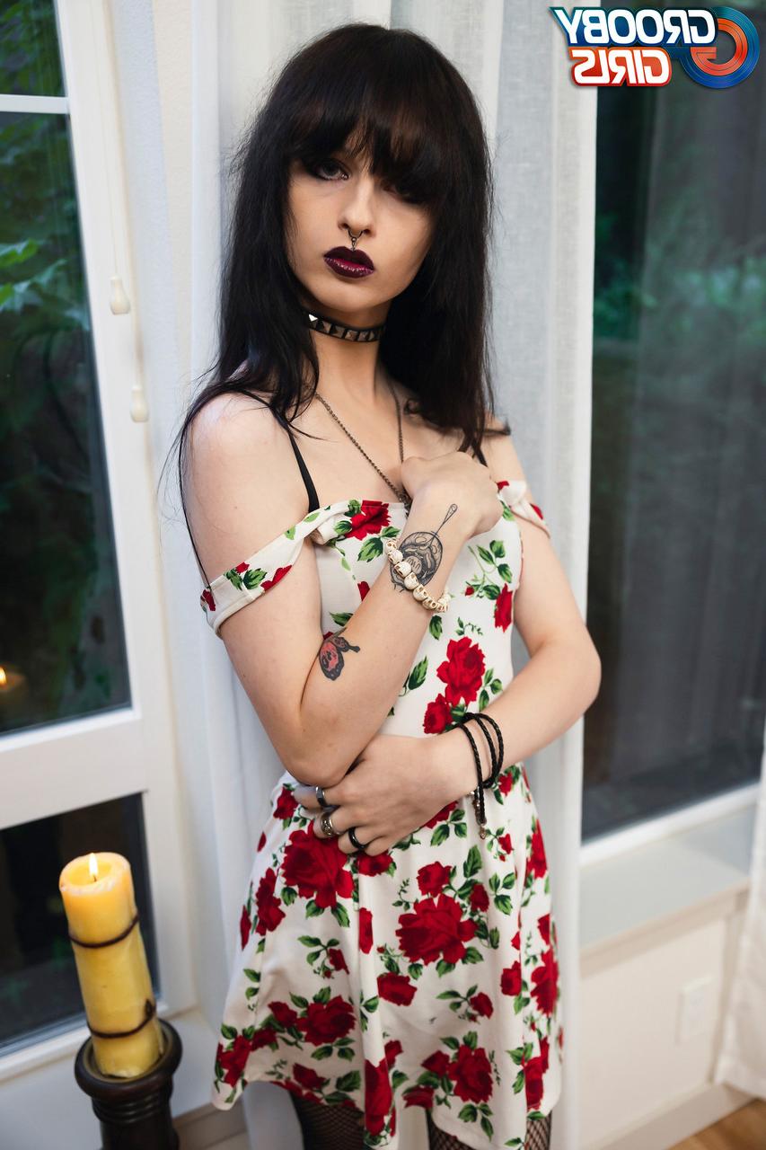 16P Raven-haired shemale Spite strips to her stockings & toys her big ass