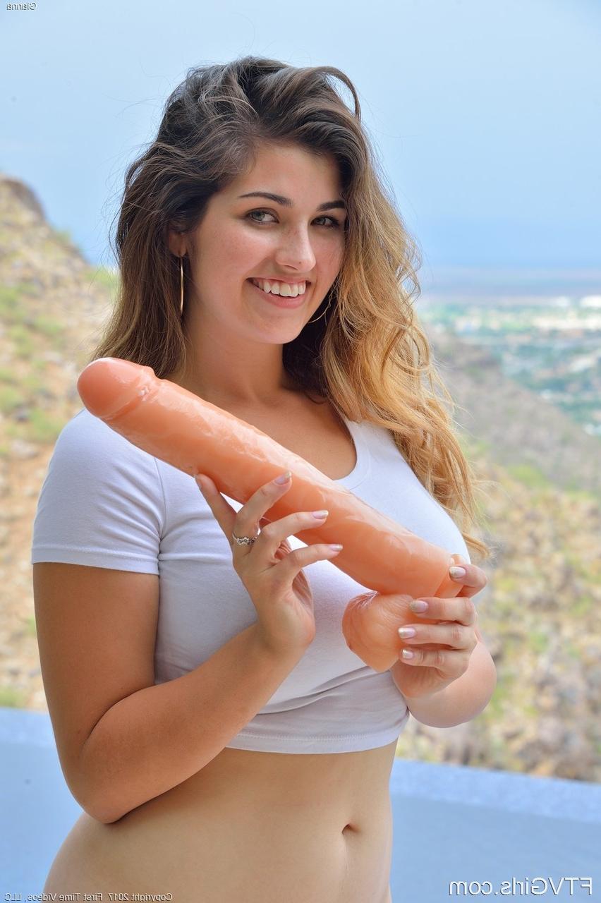16P Smiling lesbian plays with giant dildo and practices deep fisting