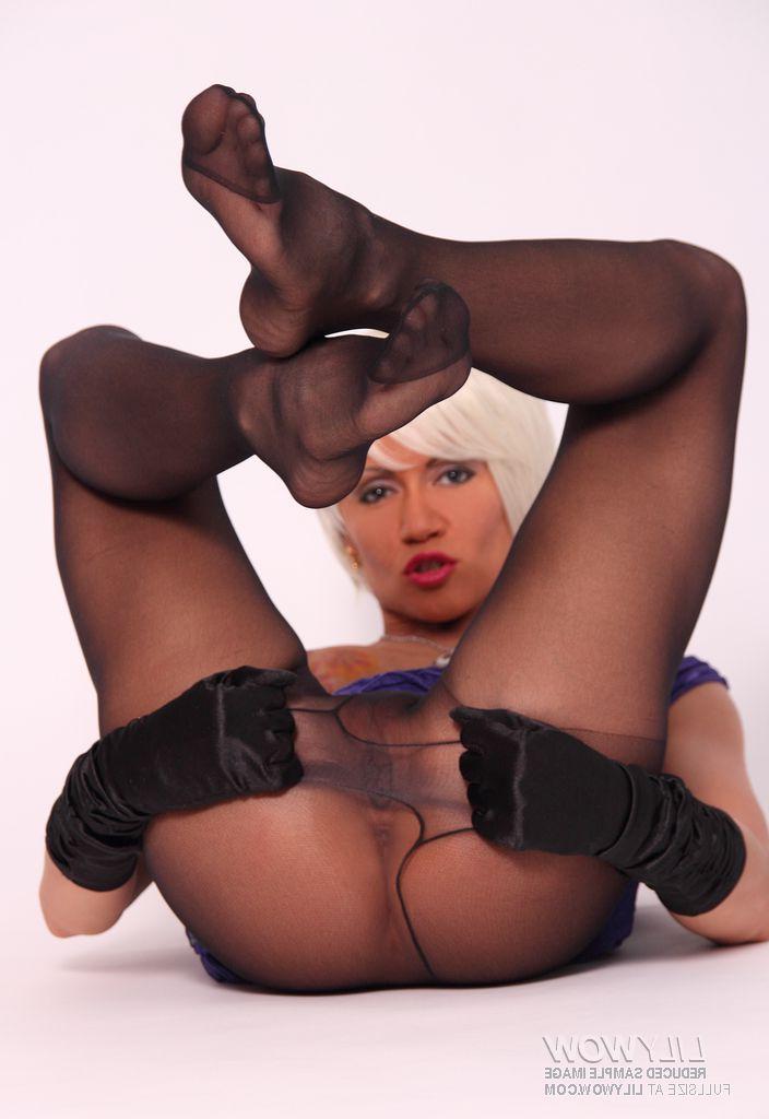 15P Platinum blonde MILF takes off a clingy dress while wearing pantyhose