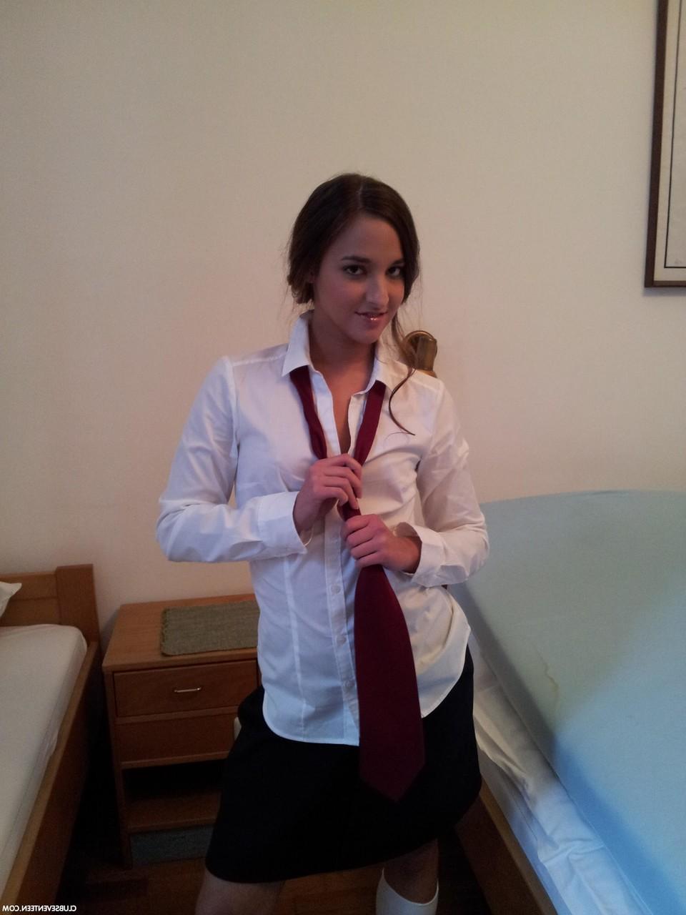 16P European teen Amira C poses enticingly while clothed in sexy outfits