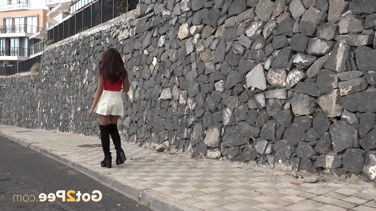 15P Solo girl Kitkate pees on the sidewalk during the middle of the day