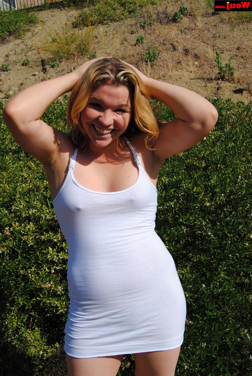 15P Chubby amateur blonde posing in her tight white dress in nature