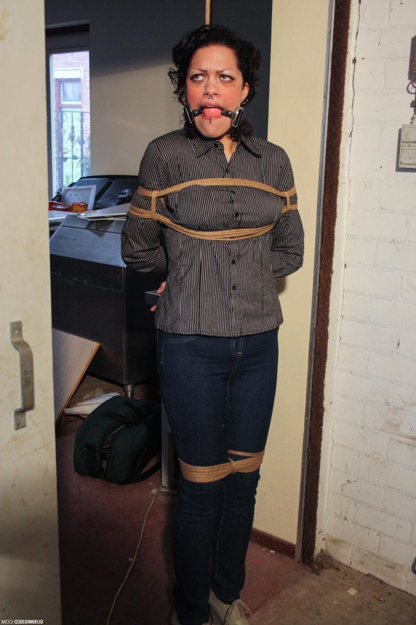 20P Ball-gagged clothed mature Steffi tries to free herself from rope bondage