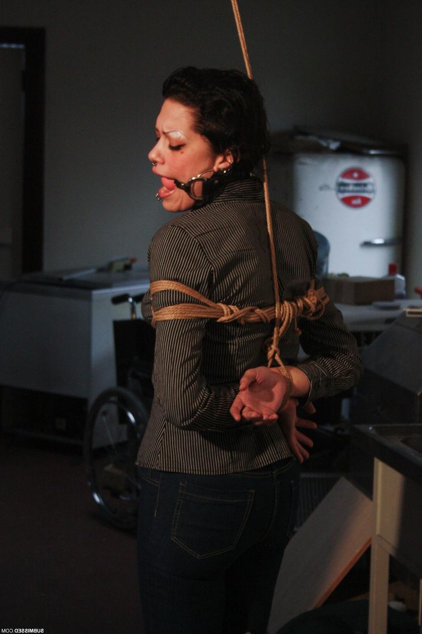 20P Ball-gagged clothed mature Steffi tries to free herself from rope bondage