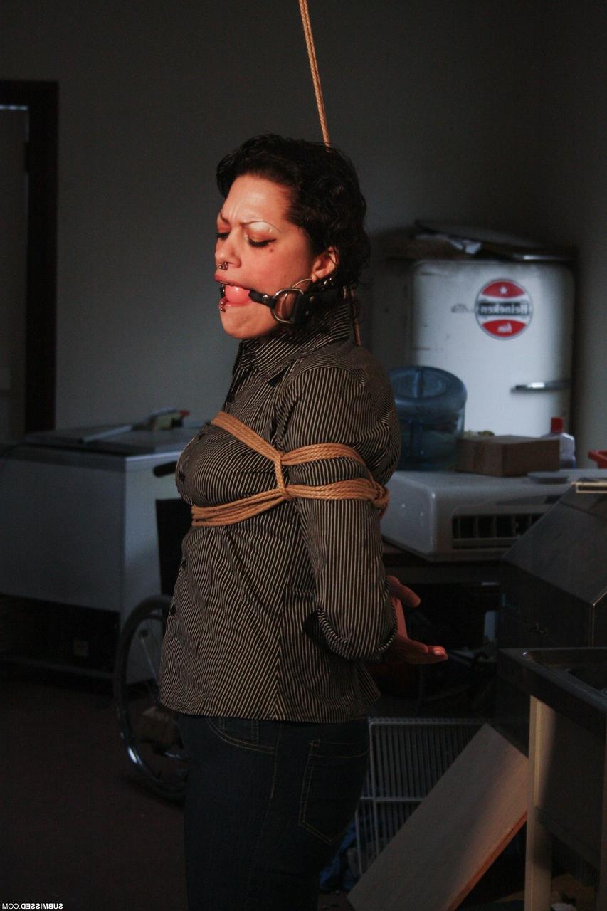 20P Ball-gagged clothed mature Steffi tries to free herself from rope bondage