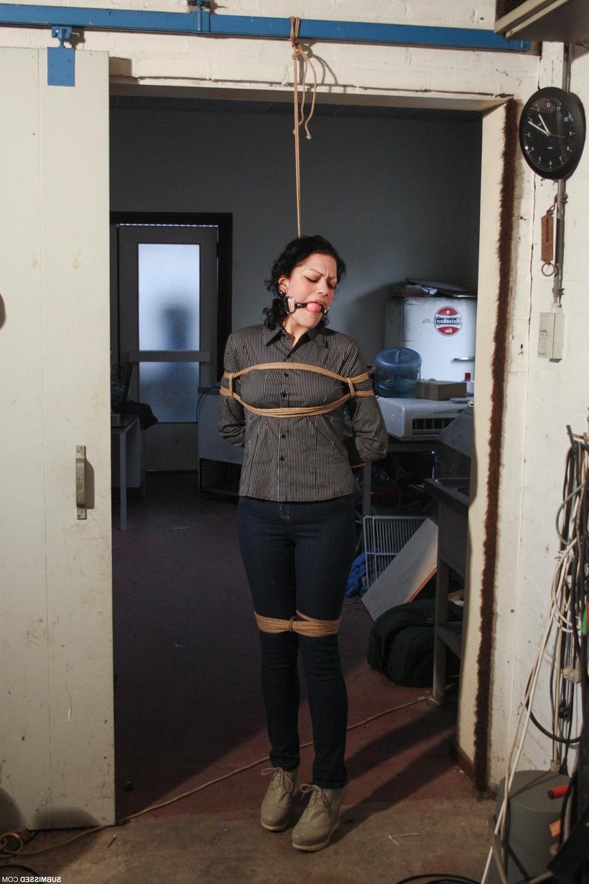 20P Ball-gagged clothed mature Steffi tries to free herself from rope bondage