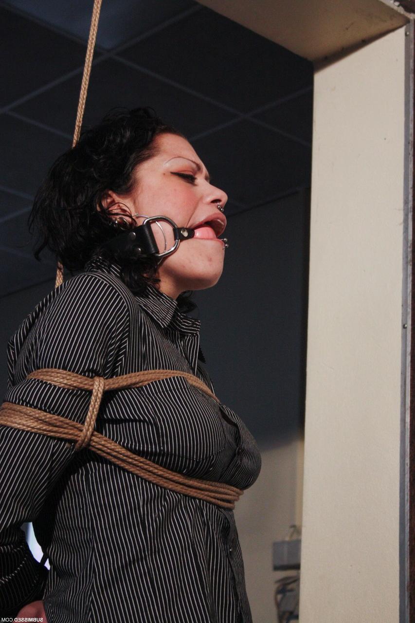 20P Ball-gagged clothed mature Steffi tries to free herself from rope bondage