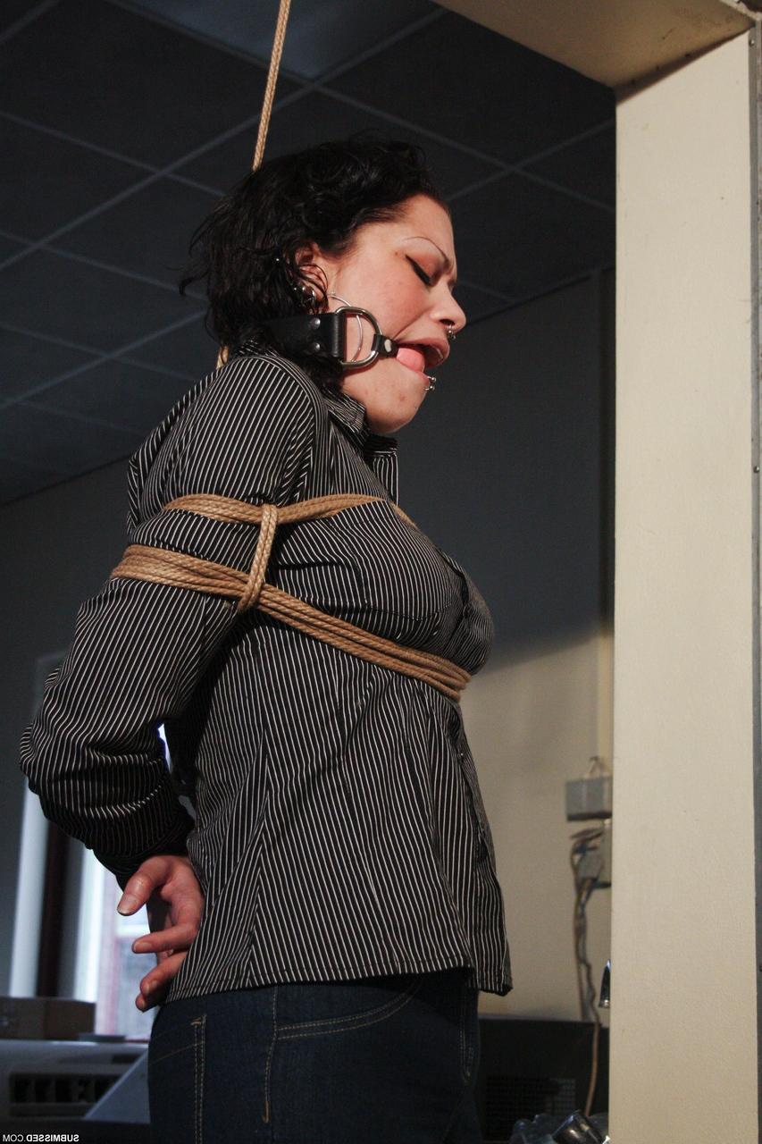 20P Ball-gagged clothed mature Steffi tries to free herself from rope bondage