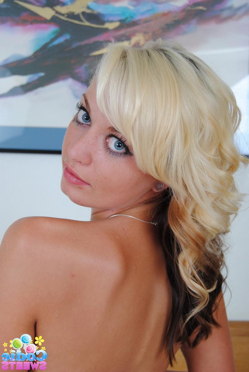 12P Blue-eyed blonde Codie Sweets frees tiny tits and bald pussy from lingerie