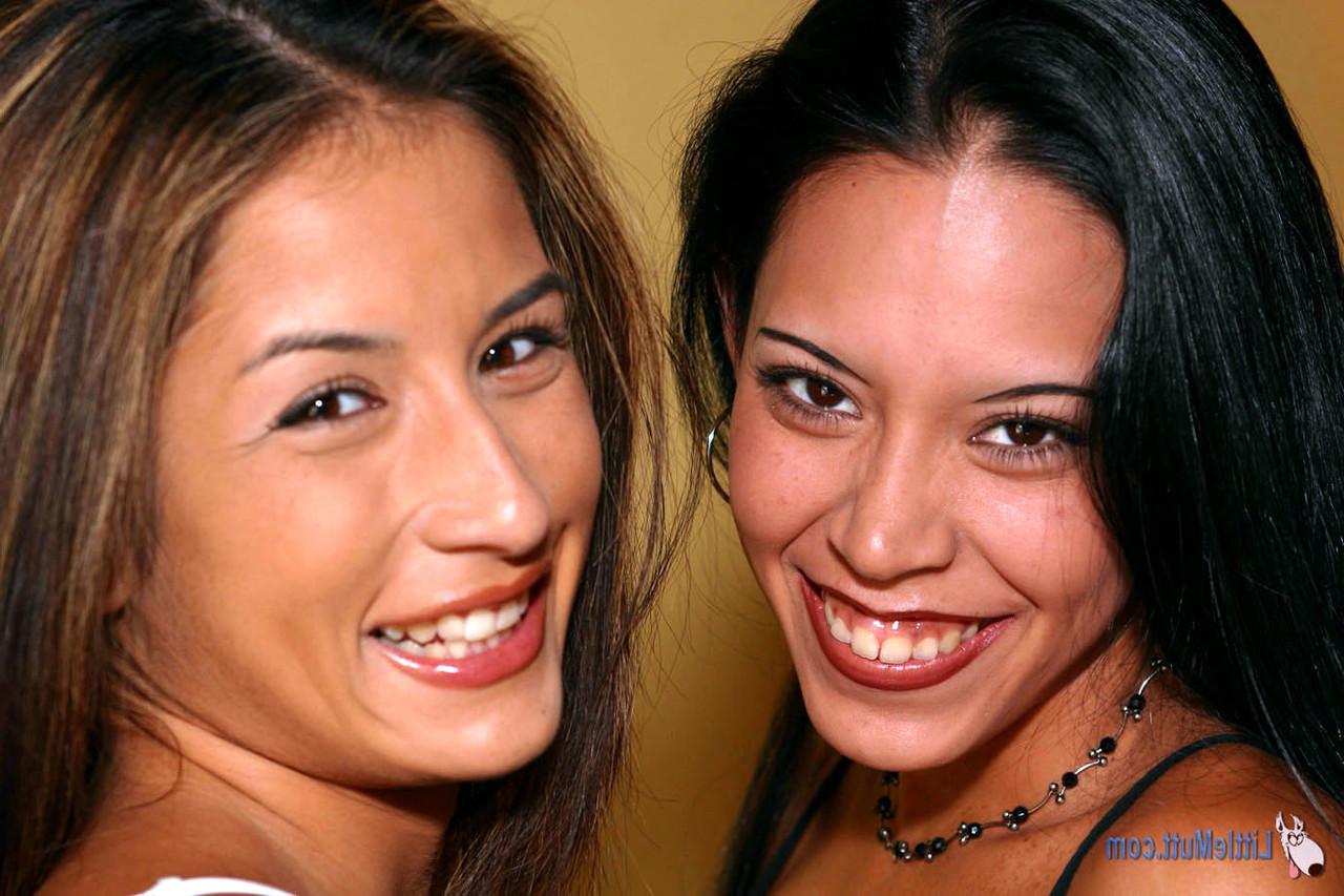 16P Latina lesbians Domino and Ramona partake in nipple sucking on a bed