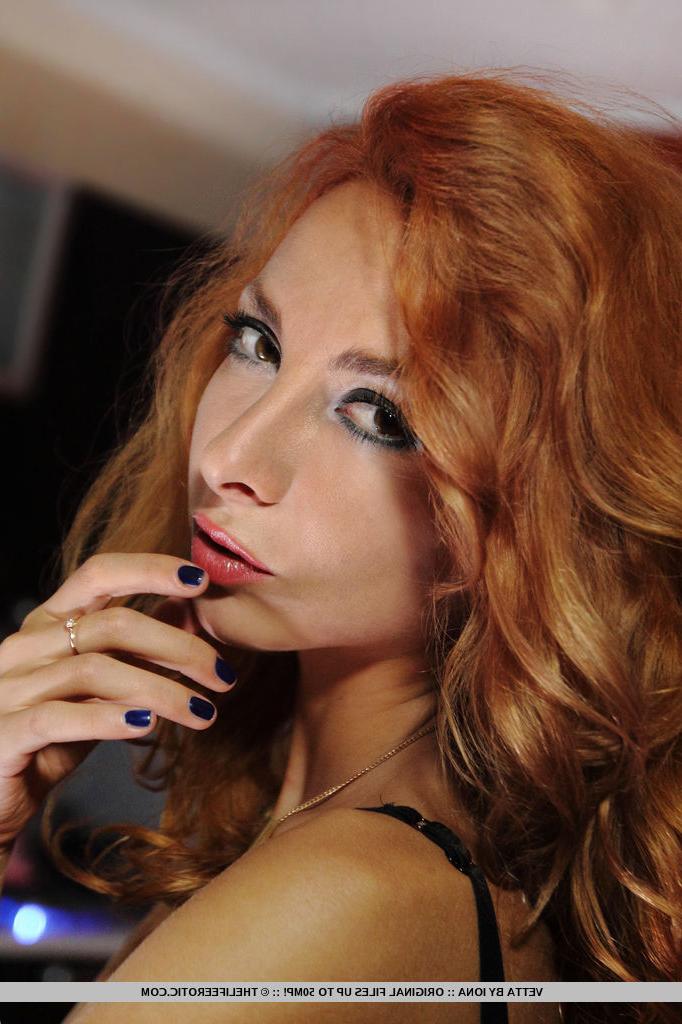 16P Skinny redhead Vetta slides her panties aside to play with her moist pussy