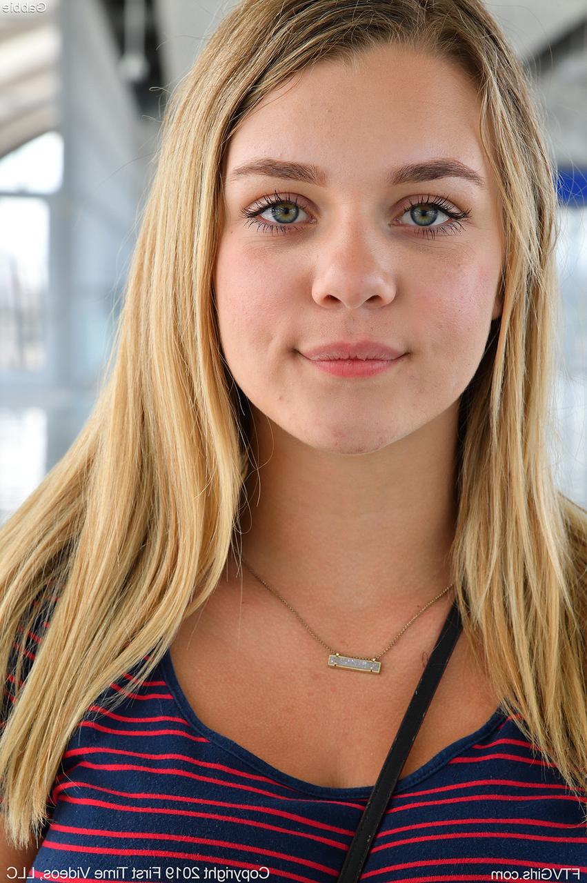20P Innocent looking amateur Gabbie in some outdoor public teasing action