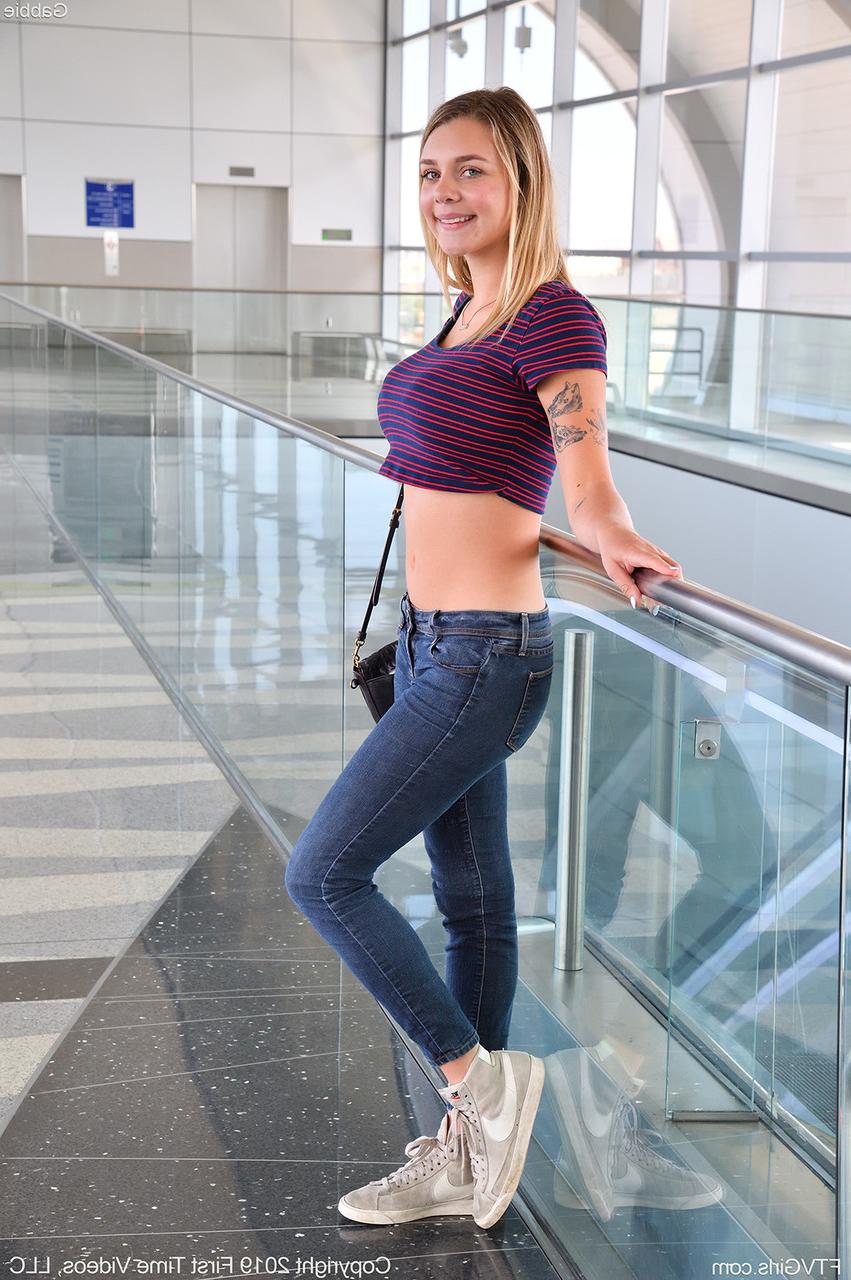 20P Innocent looking amateur Gabbie in some outdoor public teasing action