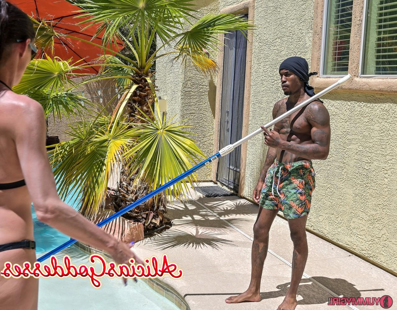 20P Tall brunette Sofie Marie blowing off a black muscular pool boy