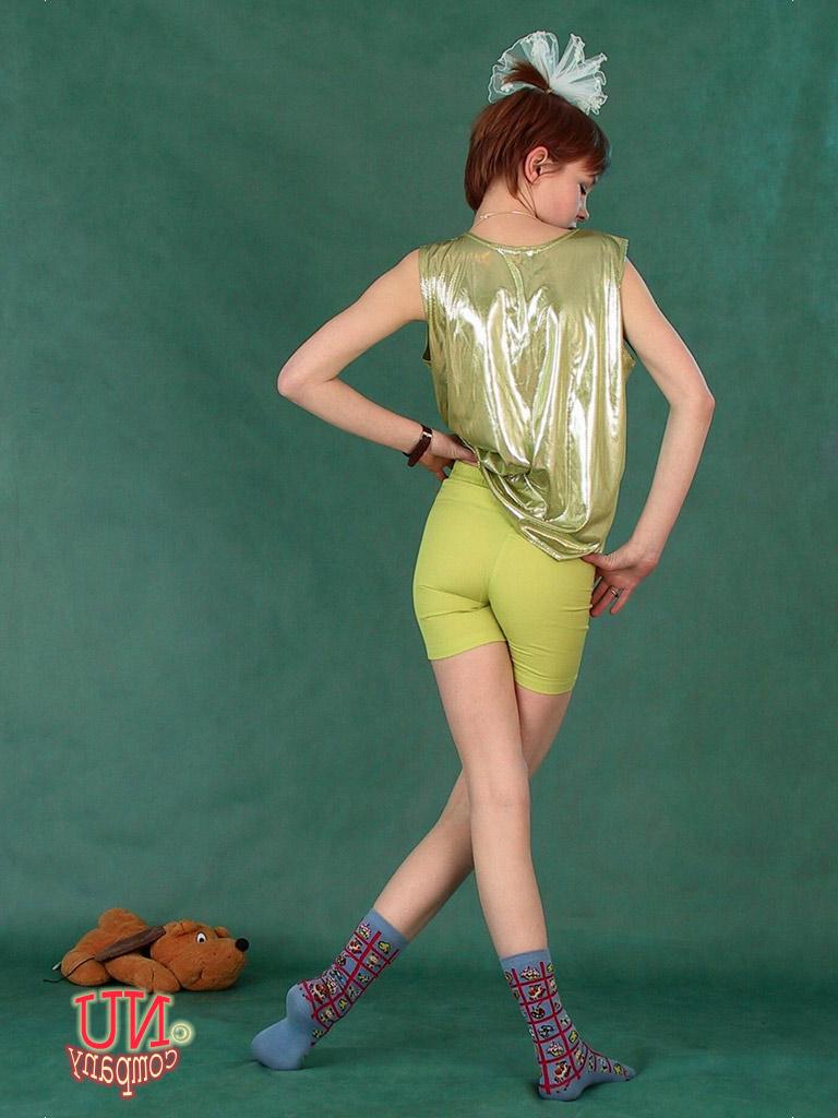 17P Cute redhead strips to her socks before proceeding to masturbate