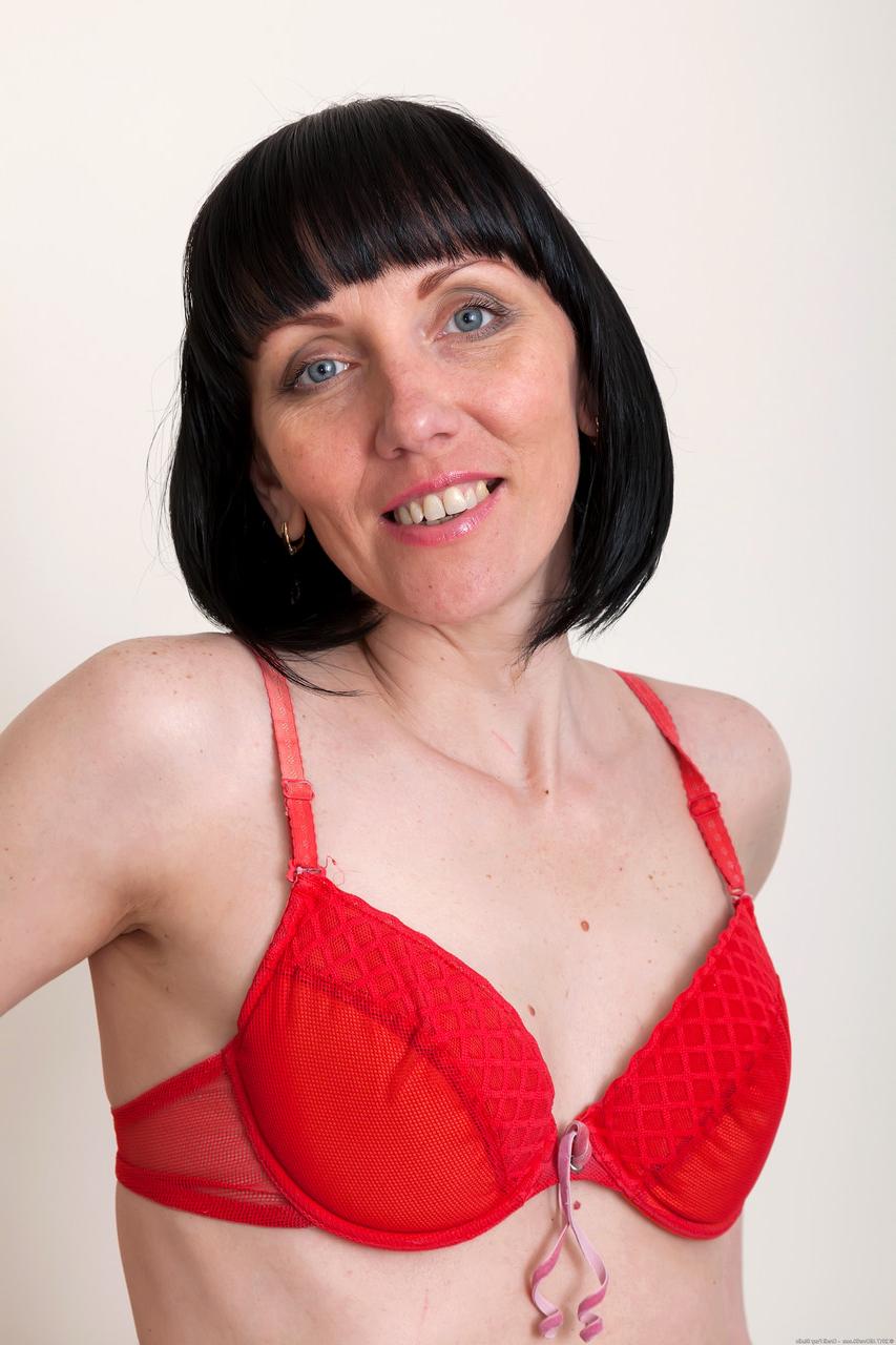 20P Hot Ukrainian MILF Cherry Despina strips and fingers herself in a solo