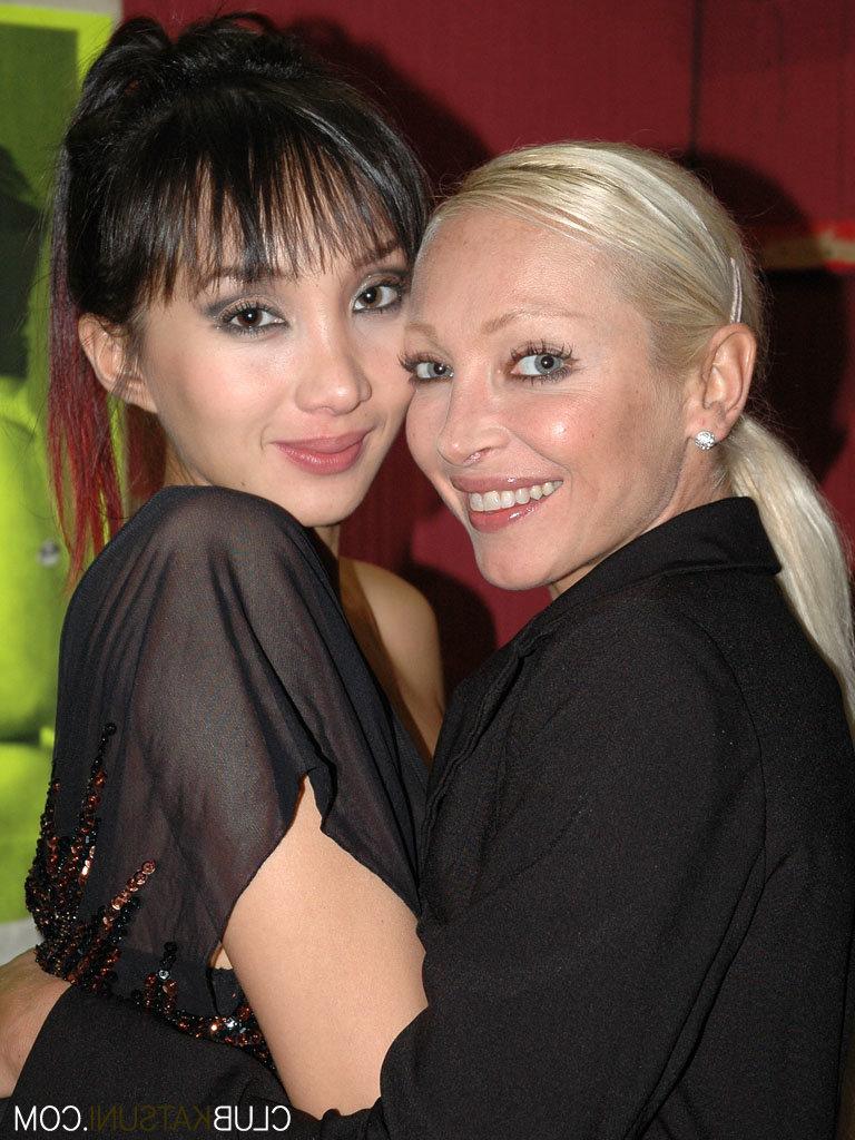 15P Asian stripper Katsuni and a blonde dancer put on a show for the boys