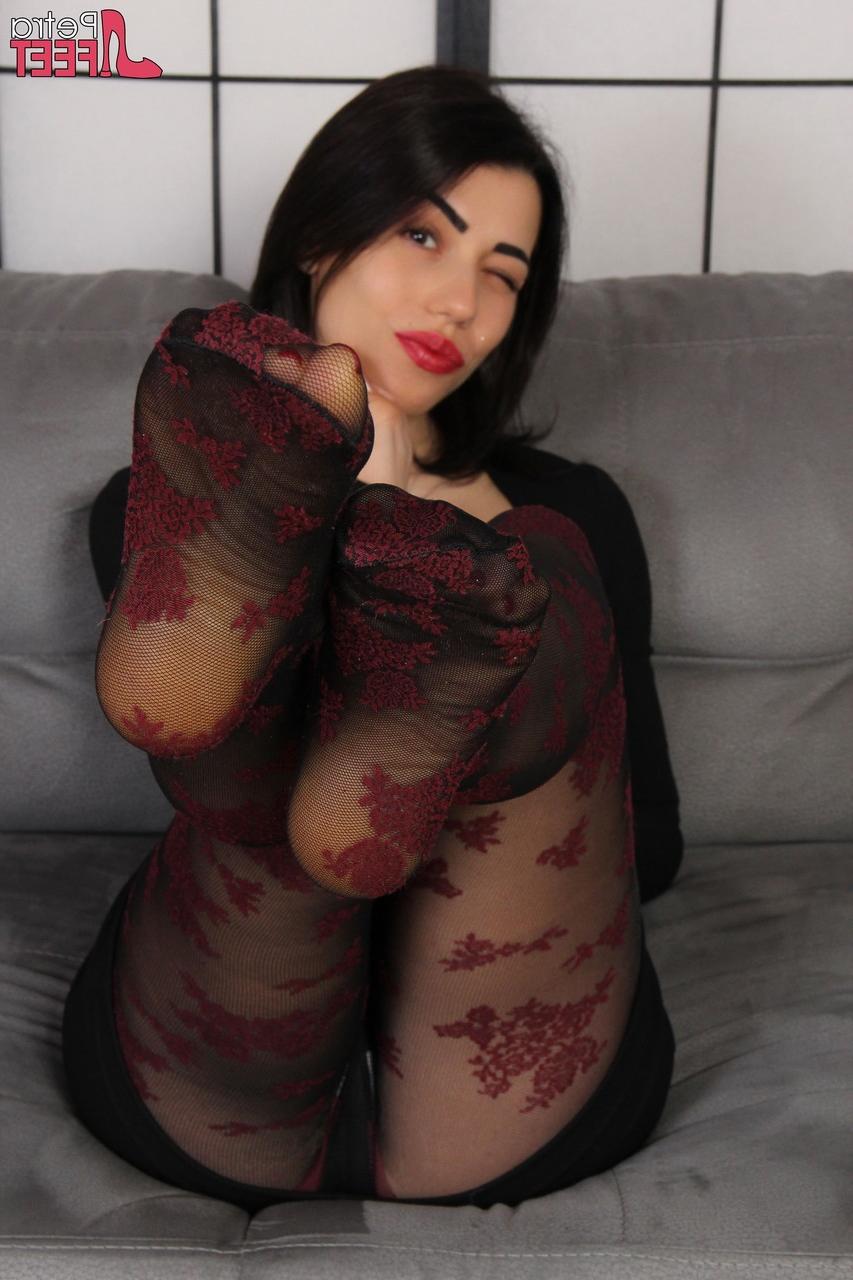10P Beautiful brunette Petra removes her UGGs while wearing sexy pantyhose