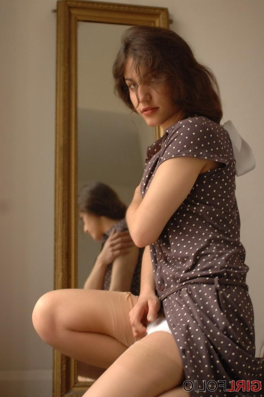 12P Pretty girl Steffi removes retro hosiery while wearing girdle panties