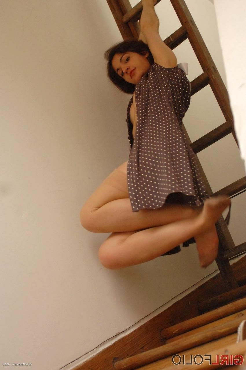 12P Pretty girl Steffi removes retro hosiery while wearing girdle panties