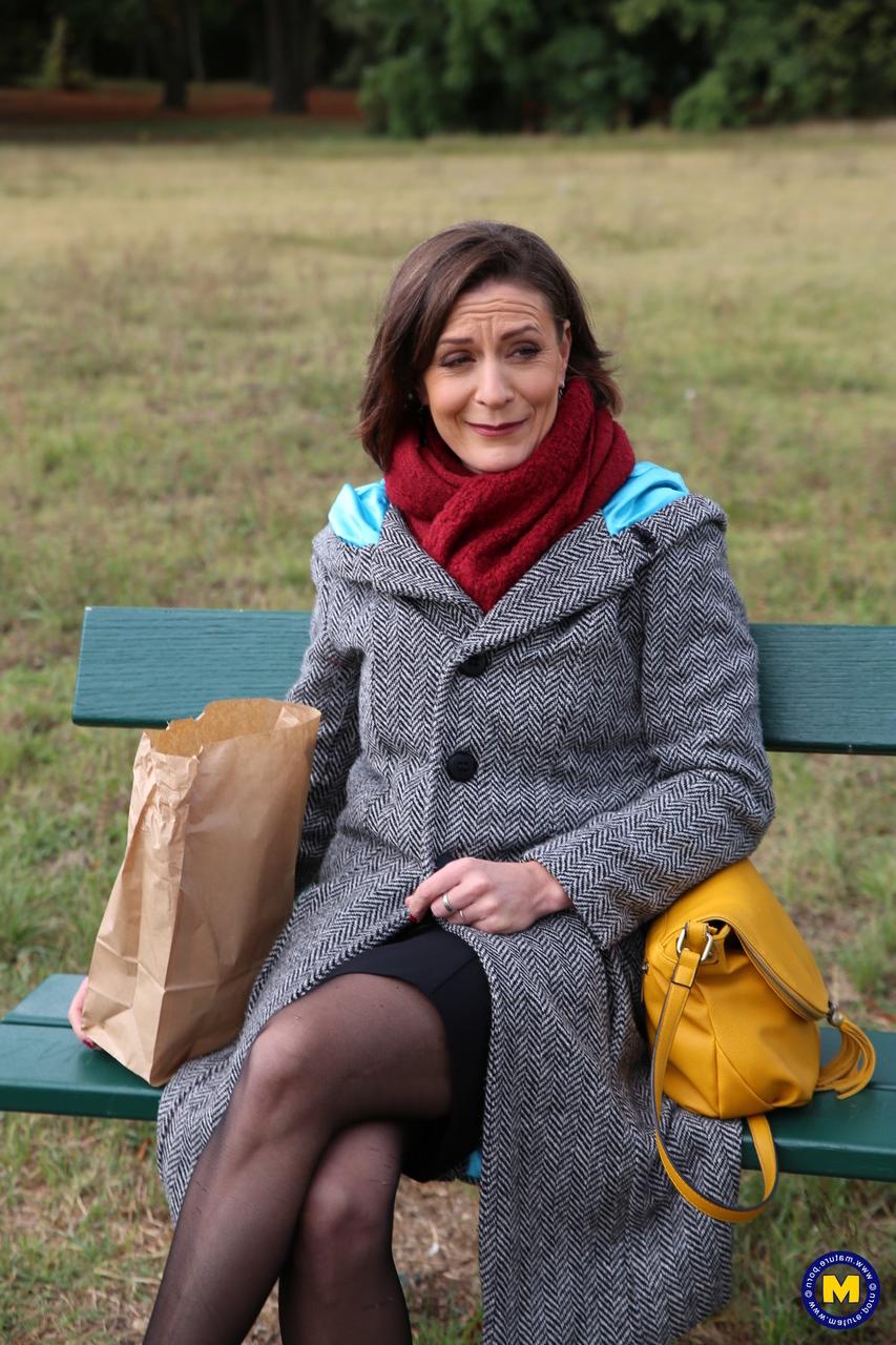 20P French mom Anya flashes her legs in stockings while eating a sandwich outside