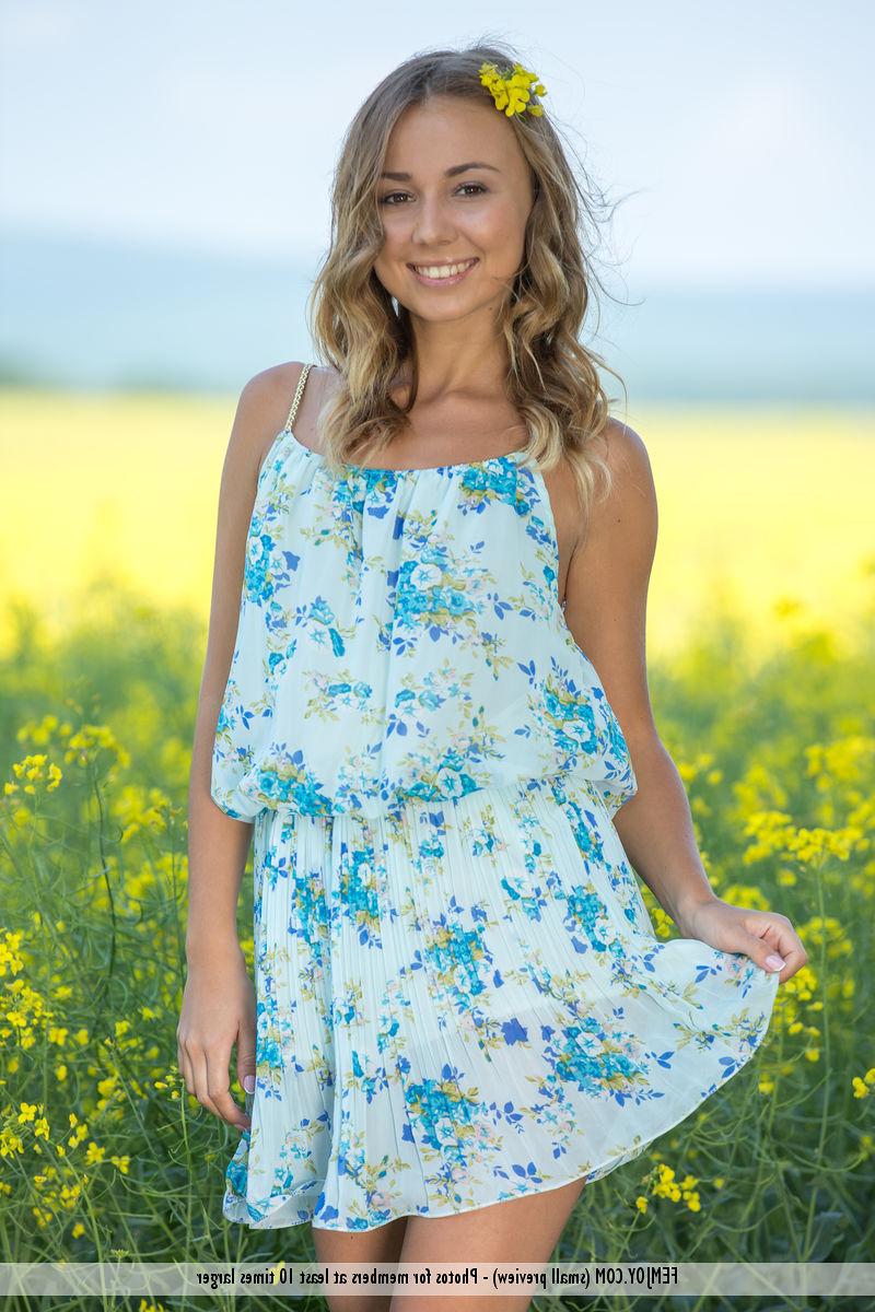 16P Adorable teen with an ass to die for shows her sweet pussy in a field