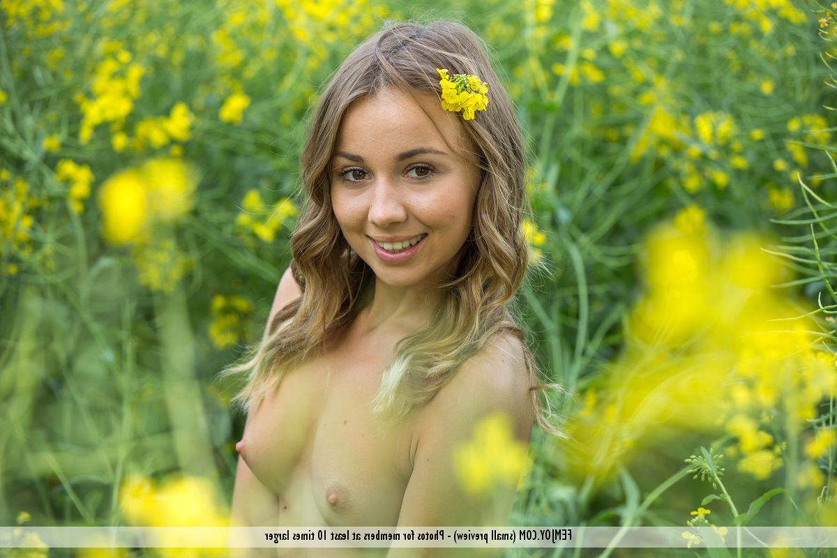 16P Adorable teen with an ass to die for shows her sweet pussy in a field