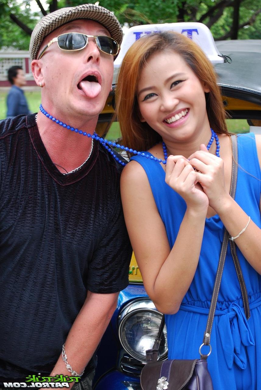 17P Beautiful Thai girl Mon flirting with a cute male tourist in public