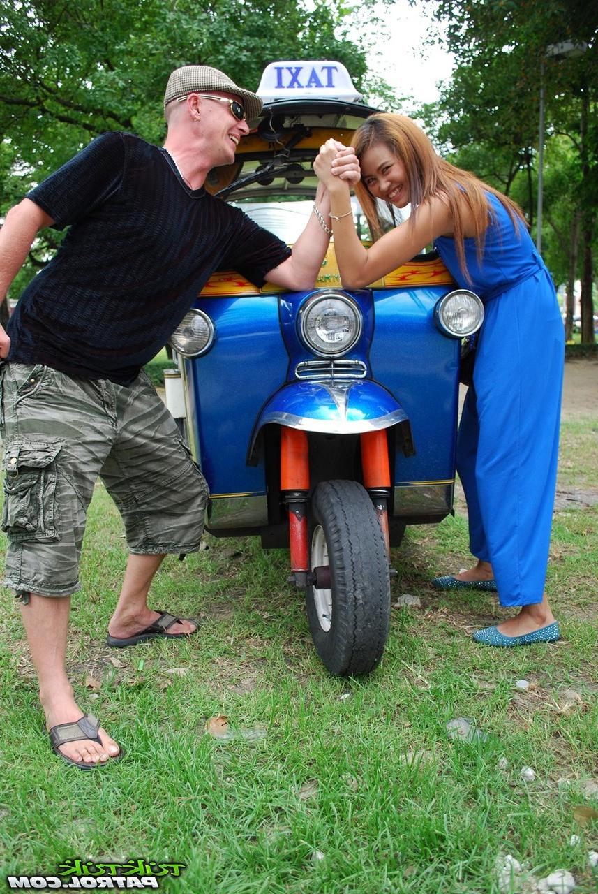 17P Beautiful Thai girl Mon flirting with a cute male tourist in public