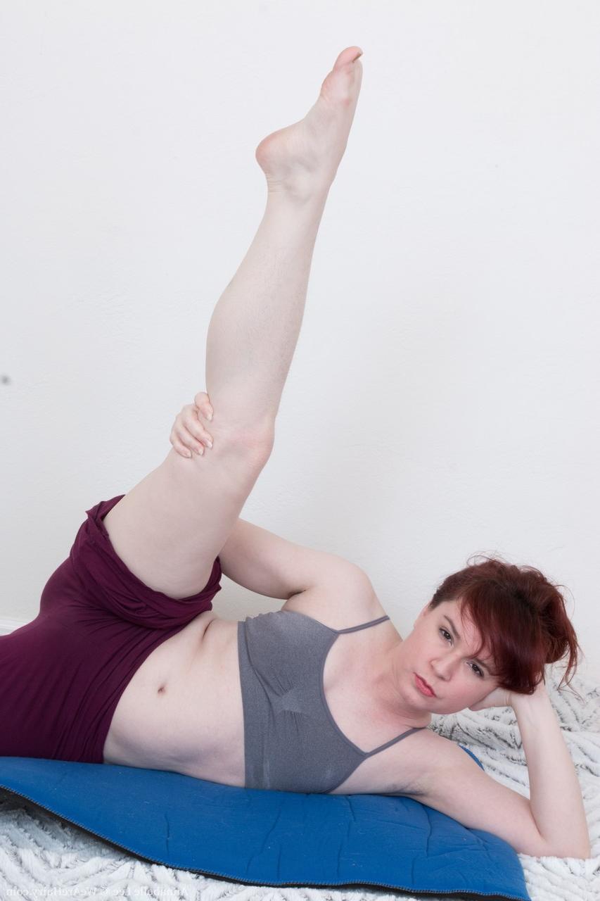 18P Pale redhead Annabelle Lee doffs workout clothes to show hairy armpits & muff